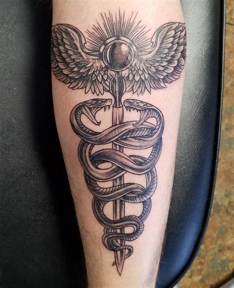 hermes staff tattoo